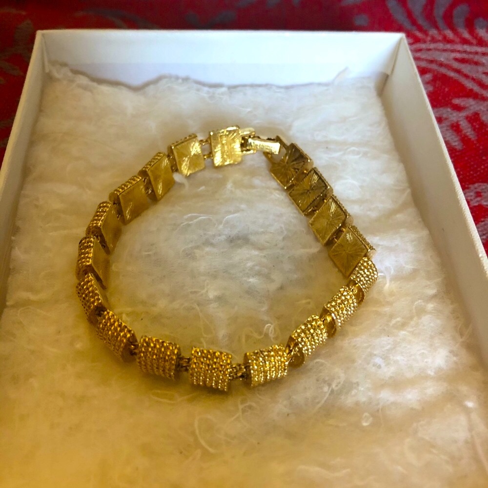 Napier quality gold tone jointed bracelet- new